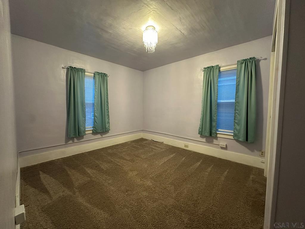 312 12th Street Windber, PA 15963 - Photo 16 of 24 an empty room with a empty space and windows