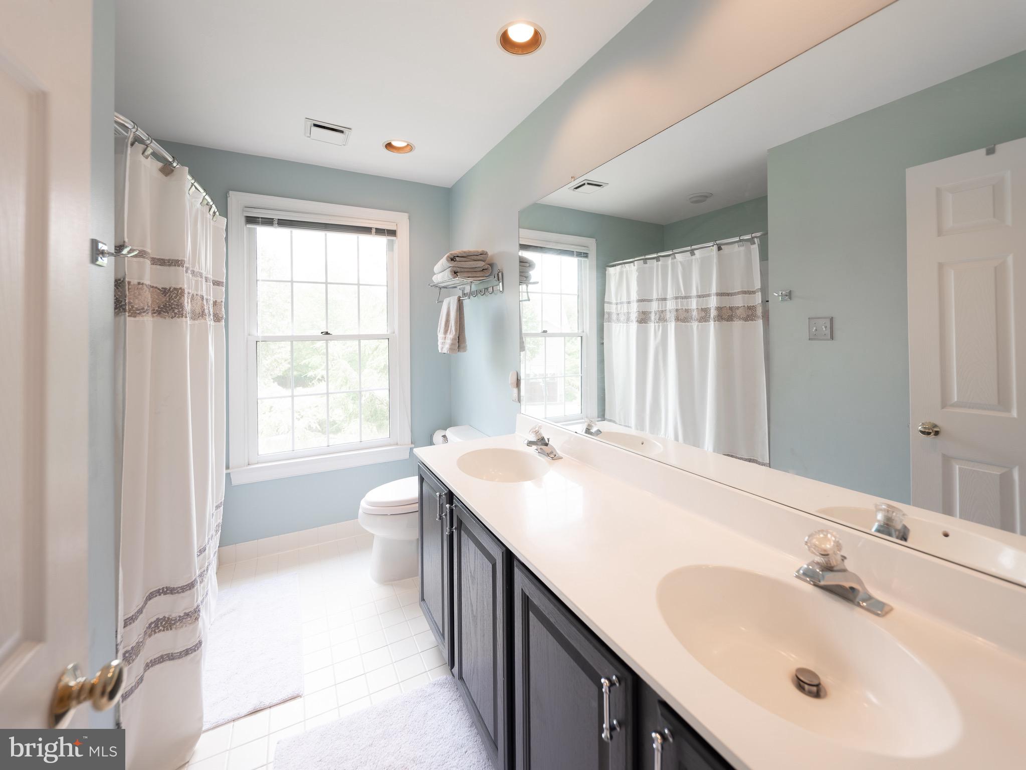 1695 Barnswallow Road Yardley, PA 19067 - Photo 40 of 69 Large hall bathroom with double sink