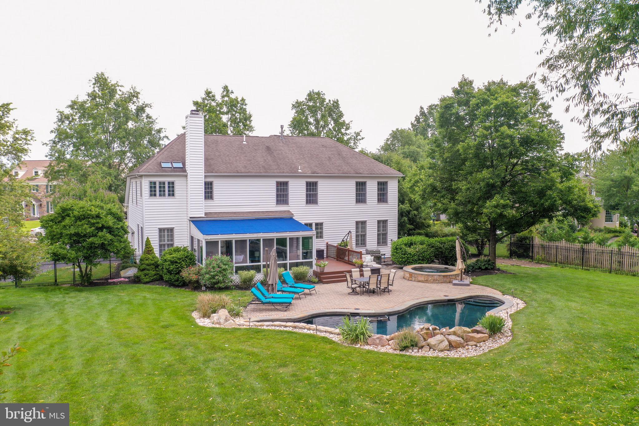 1695 Barnswallow Road Yardley, PA 19067 - Photo 53 of 69 Rolling lawn wraps the pool area