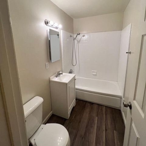 a view of a building with sitting area