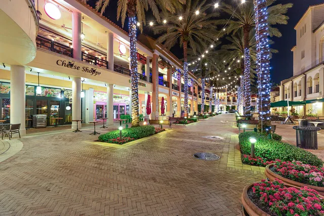 a view of a street with sitting area