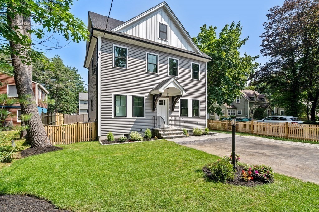 504 Hudson Road Sudbury, MA 01776 - Photo 1 of 42 a front view of a house with a yard and trees
