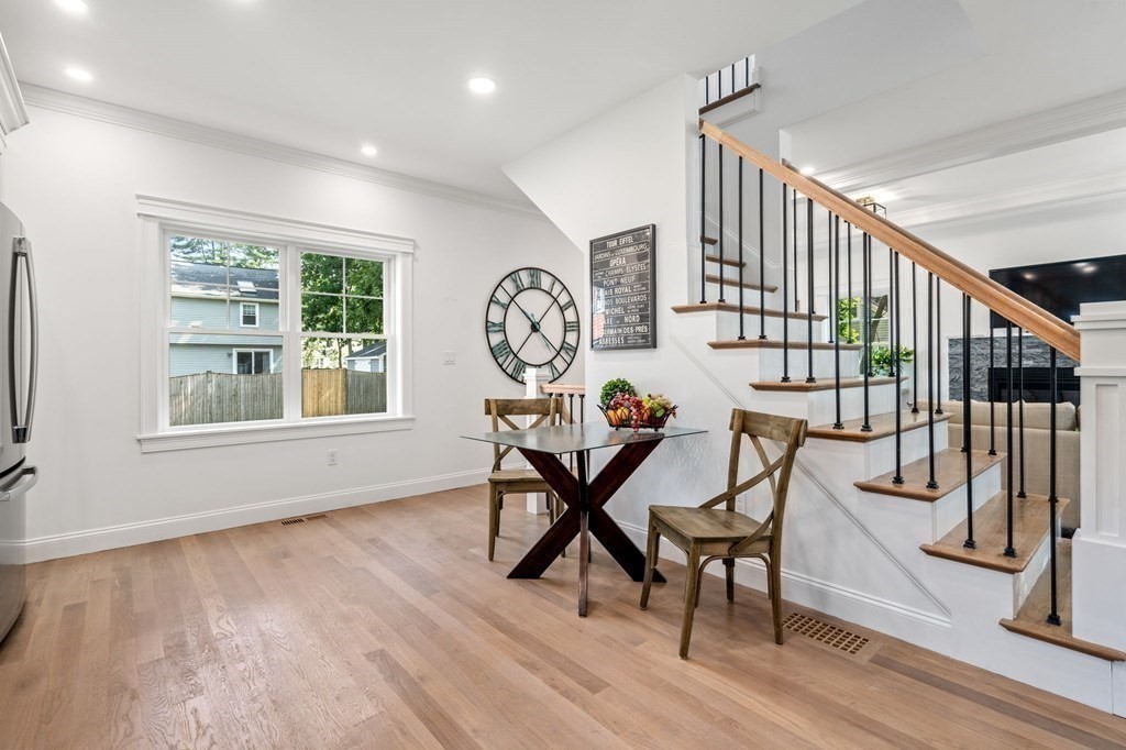 504 Hudson Road Sudbury, MA 01776 - Photo 17 of 42 a view of a room with furniture wooden floor and windows
