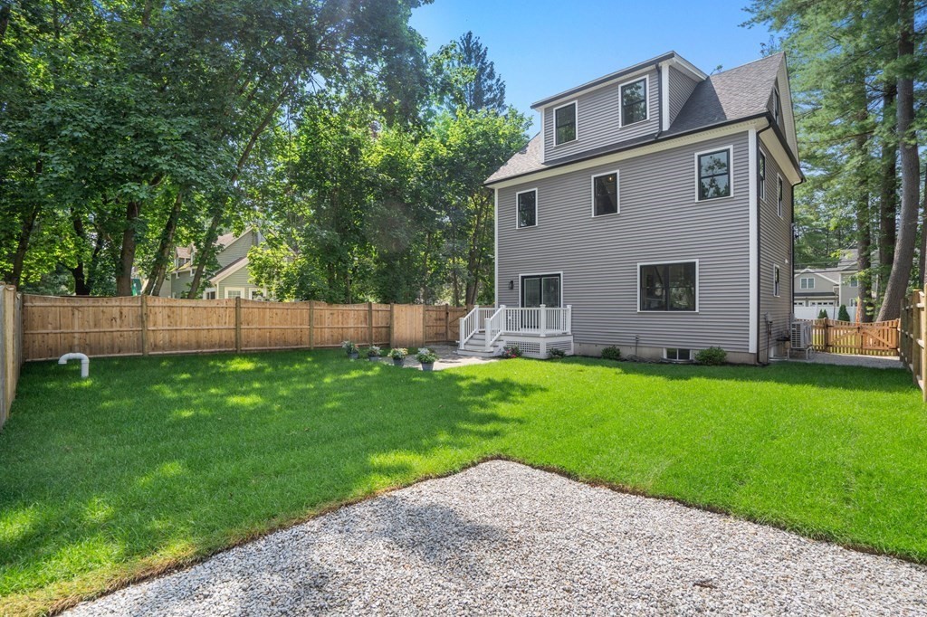 504 Hudson Road Sudbury, MA 01776 - Photo 2 of 42 a front view of house with yard