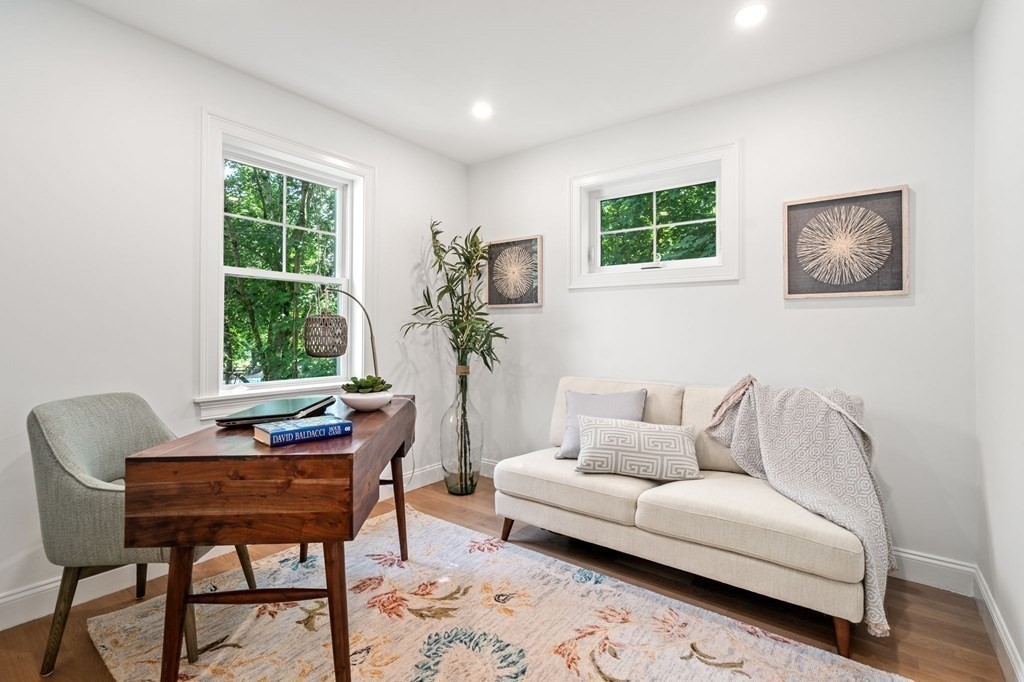 504 Hudson Road Sudbury, MA 01776 - Photo 30 of 42 a living room with furniture and a window
