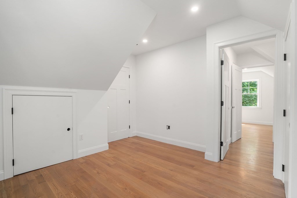 504 Hudson Road Sudbury, MA 01776 - Photo 35 of 42 wooden floor in an empty room