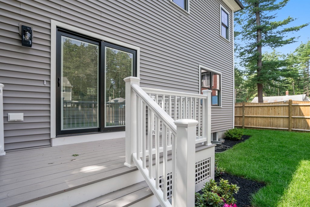 504 Hudson Road Sudbury, MA 01776 - Photo 41 of 42 a view of backyard with green space