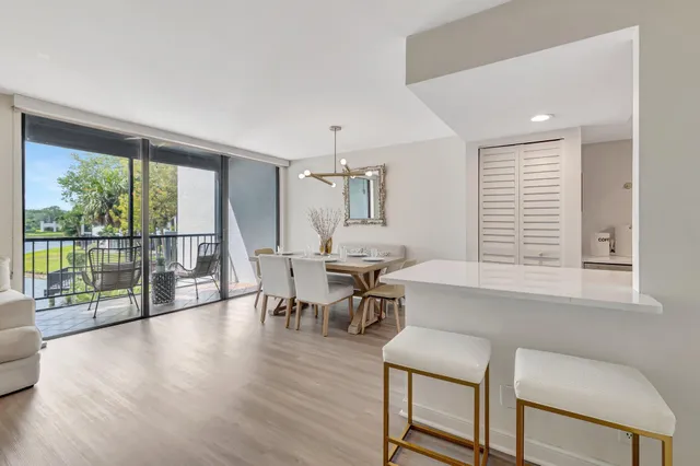 a group of people sitting in a big room