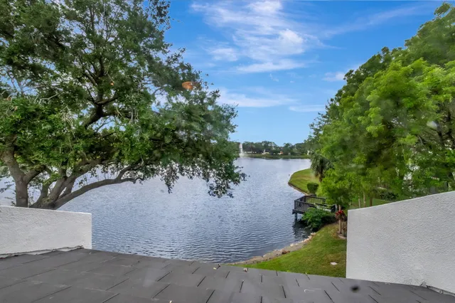 a kitchen with stainless steel appliances a refrigerator and a cabinets
