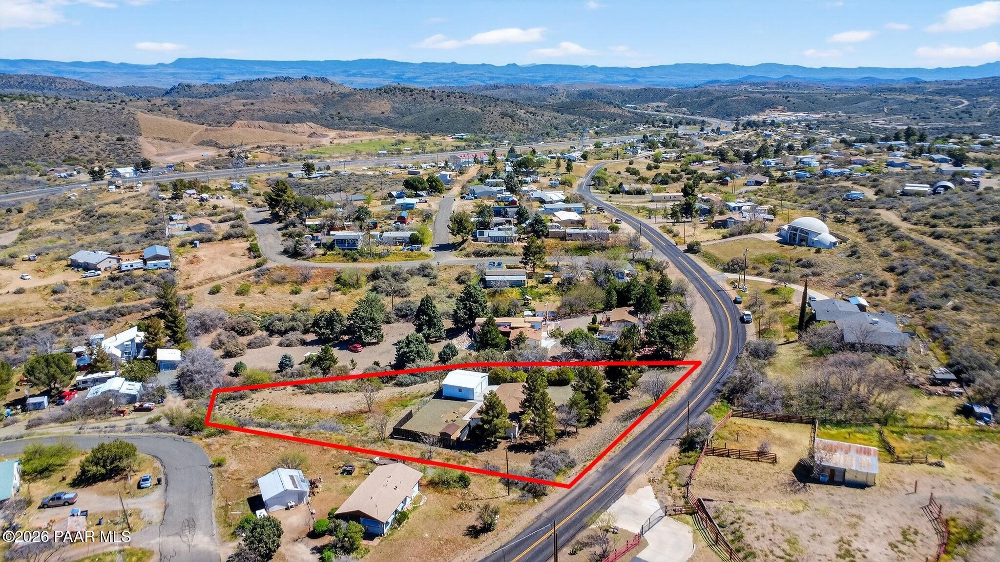 13230 East Main Street Mayer, AZ 86333 - Photo 4 of 32 an aerial view of a city and mountain view