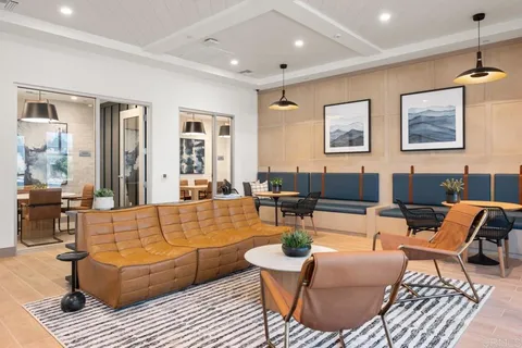 a kitchen with stainless steel appliances a stove microwave and sink