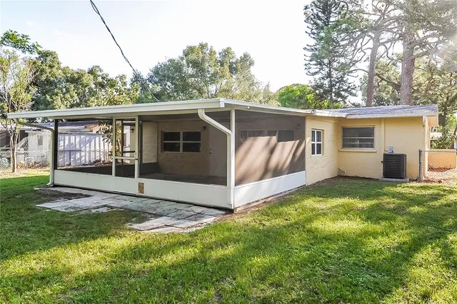 a view of a backyard with a garden and stairs