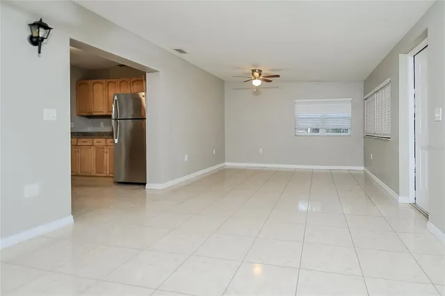 wooden floor in an empty room and a window