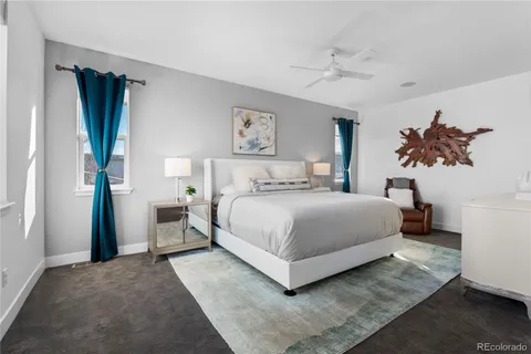a bathroom with a shower sink and mirror