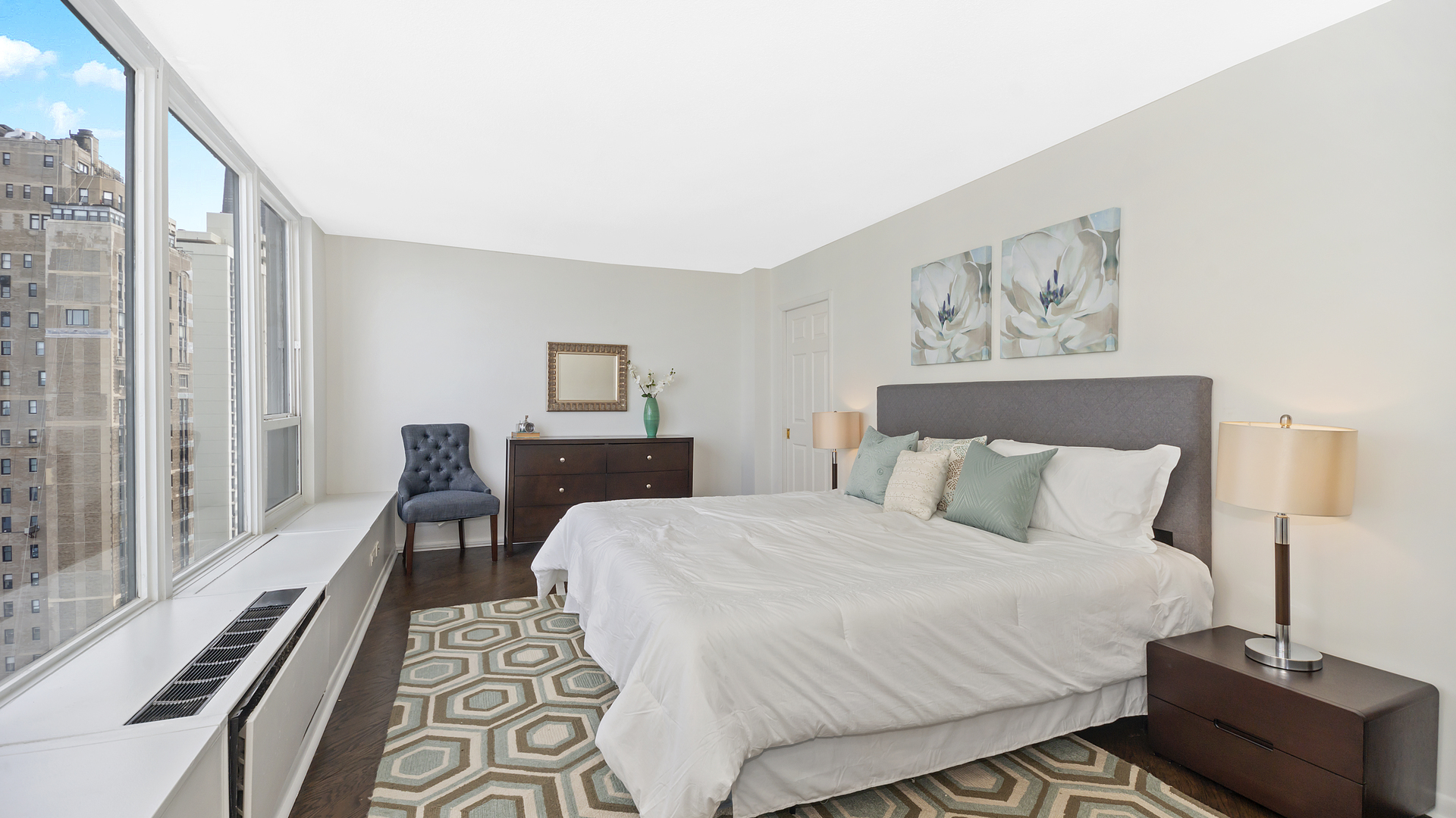 1313 North Ritchie Court, Unit 2405 Chicago, IL 60610 - Photo 11 of 26 a bedroom with a bed and a table