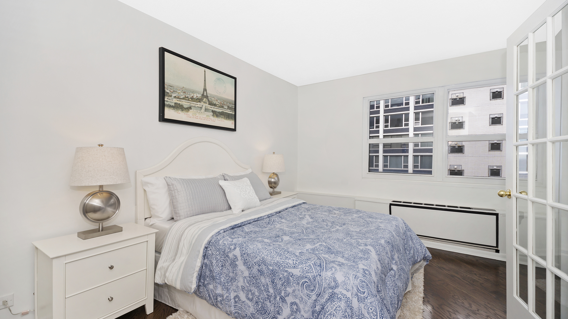 1313 North Ritchie Court, Unit 2405 Chicago, IL 60610 - Photo 15 of 26 a bedroom with a bed and a window