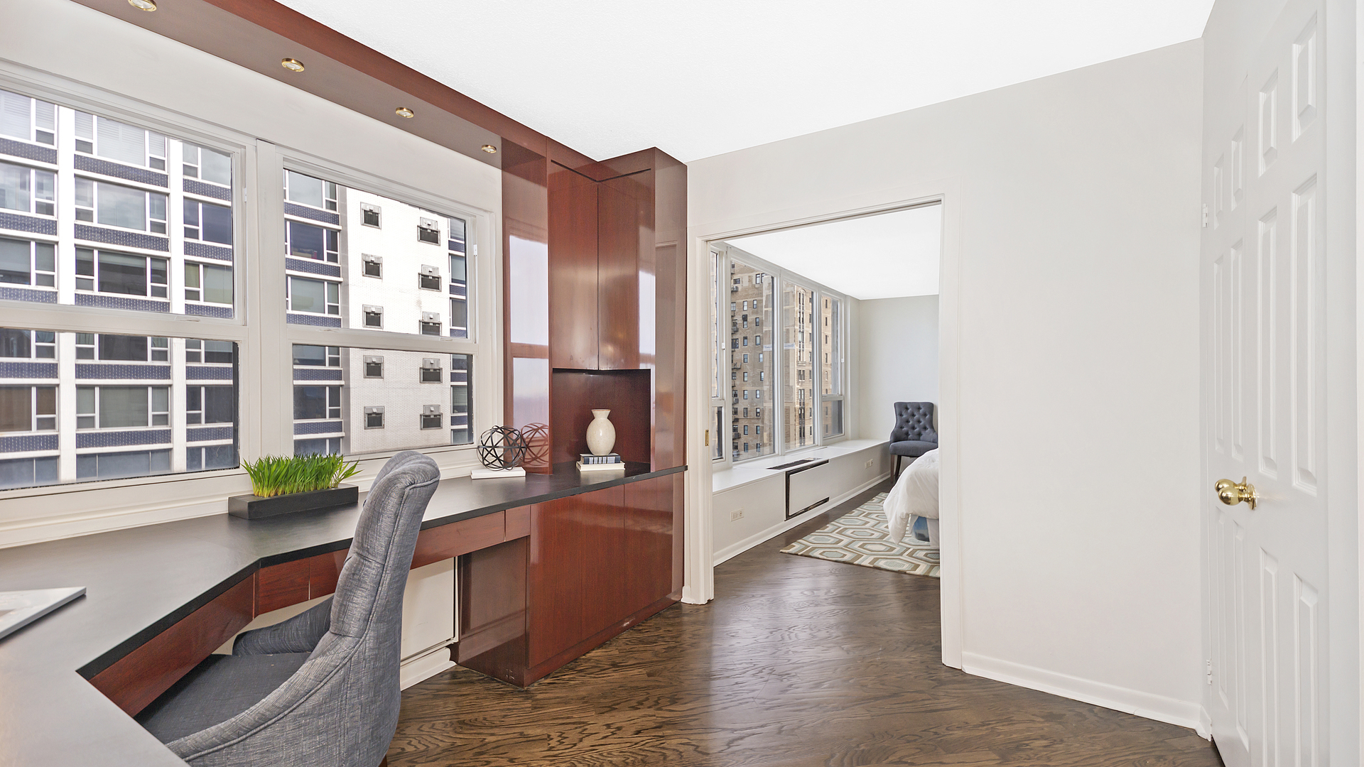 1313 North Ritchie Court, Unit 2405 Chicago, IL 60610 - Photo 18 of 26 a view of a large room with furniture and windows