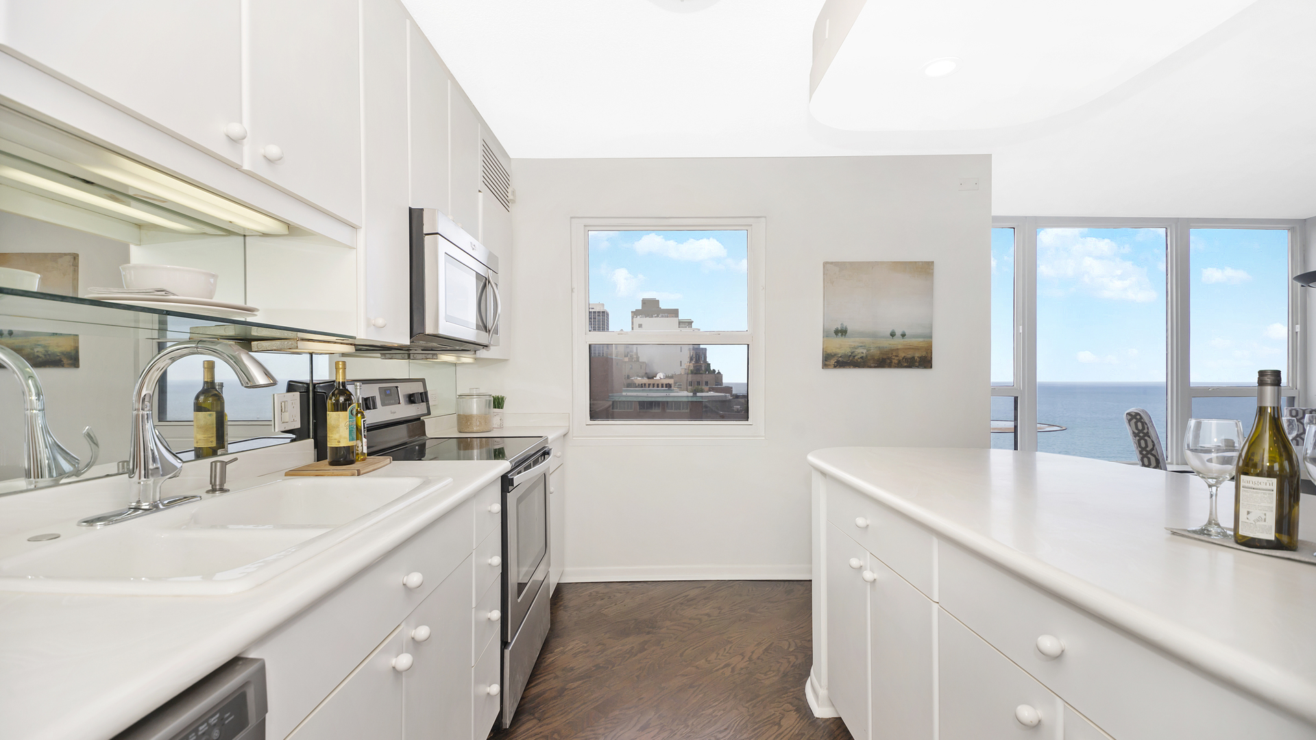 1313 North Ritchie Court, Unit 2405 Chicago, IL 60610 - Photo 8 of 26 a kitchen with a sink cabinets and appliances
