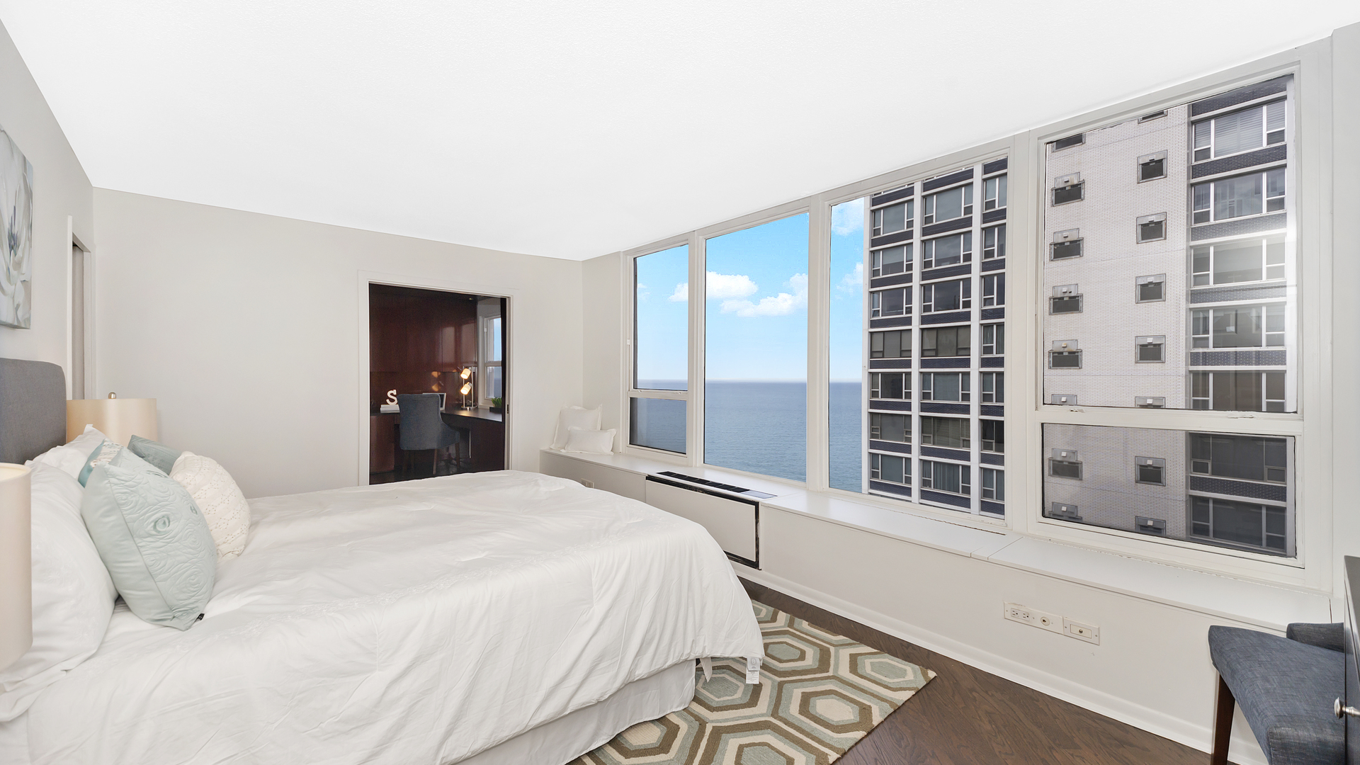 1313 North Ritchie Court, Unit 2405 Chicago, IL 60610 - Photo 9 of 26 a bedroom with a bed and a window