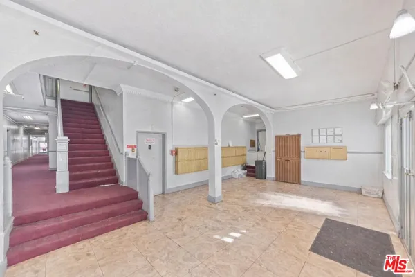 a view of a hallway with staircase