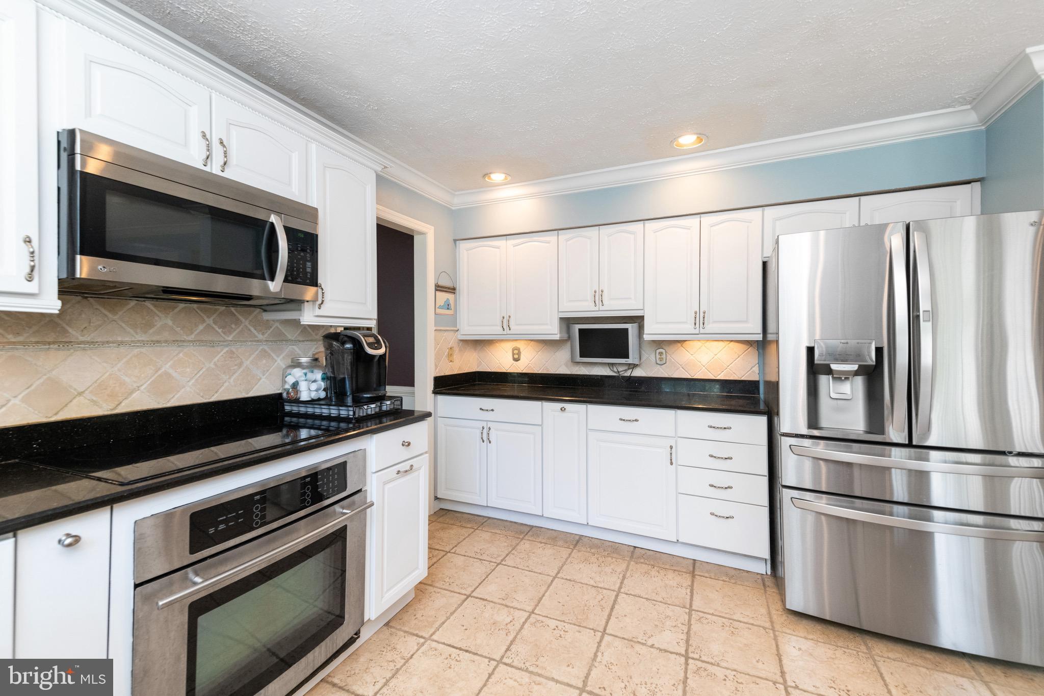 10265 Wetherburn Road Ellicott City, MD 21042 - Photo 3 of 28 Stainless appliances