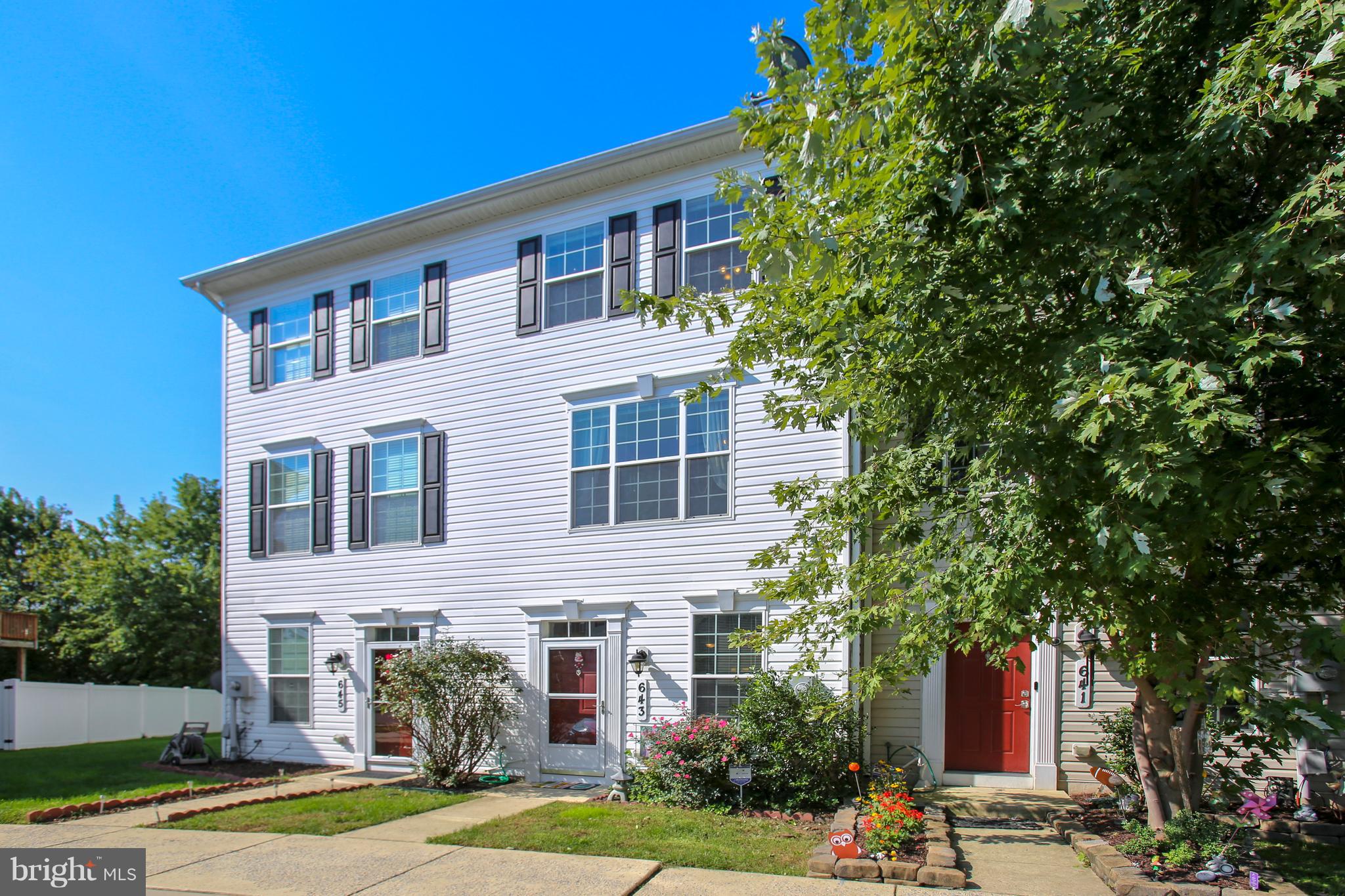 643 Tivoli Road Frederick, MD 21703 - Photo 2 of 30 a front view of a house with a yard