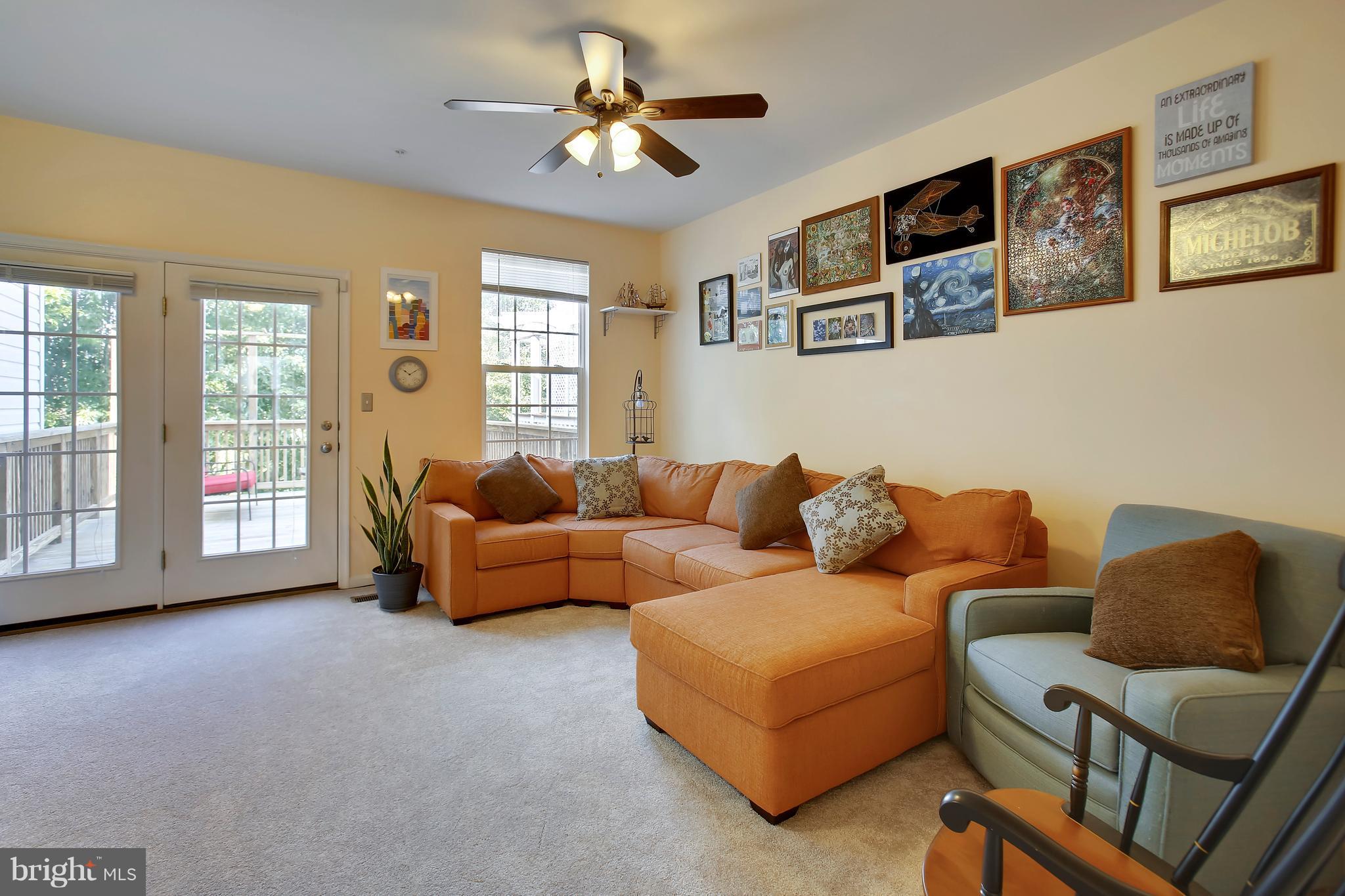 643 Tivoli Road Frederick, MD 21703 - Photo 16 of 30 a living room with furniture and a large window