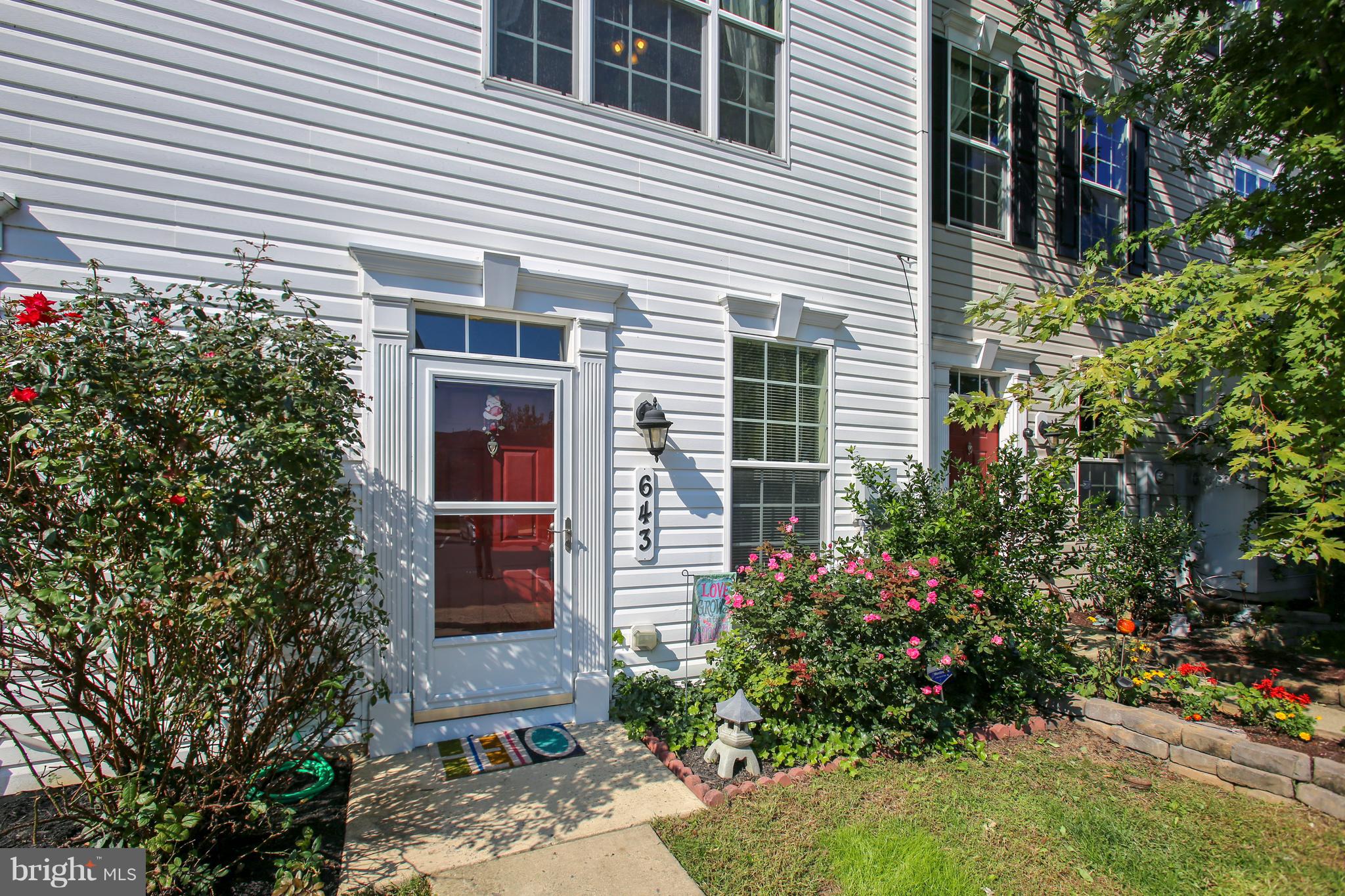 643 Tivoli Road Frederick, MD 21703 - Photo 3 of 30 a front view of a house with garden