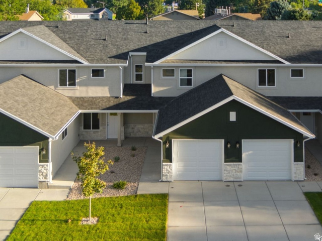 1627 North Angel Street Layton, UT 84041 - Photo 1 of 39 View of front facade with stone siding, roof with shingles, and stucco siding