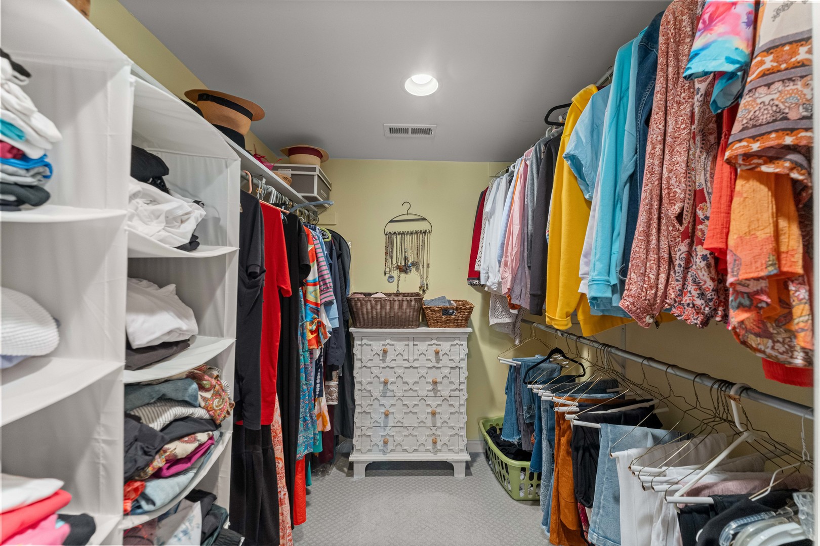 725 North County Line Road Hinsdale, IL 60521 - Photo 19 of 34 a view of walk in closet with clothes and shoes