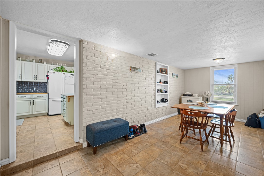 464 Sunset Ingleside, TX 78362 - Photo 3 of 35 a view of a dining room with furniture