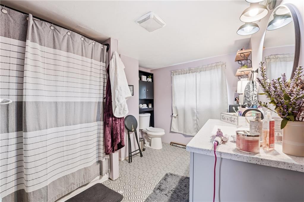 117 Erie Street Polk, PA 16342 - Photo 16 of 35 a bathroom with a sink and a mirror