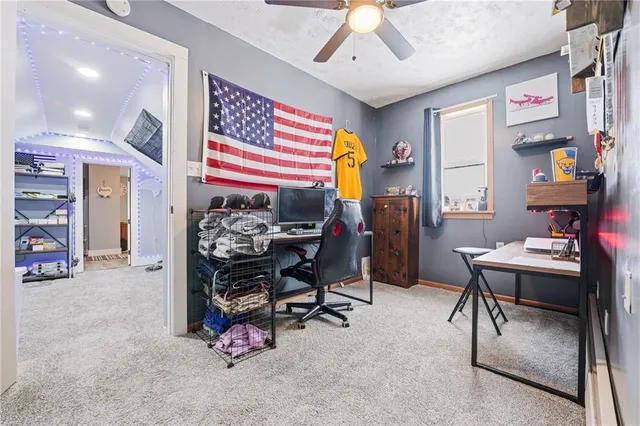 a workspace with furniture and a chandelier