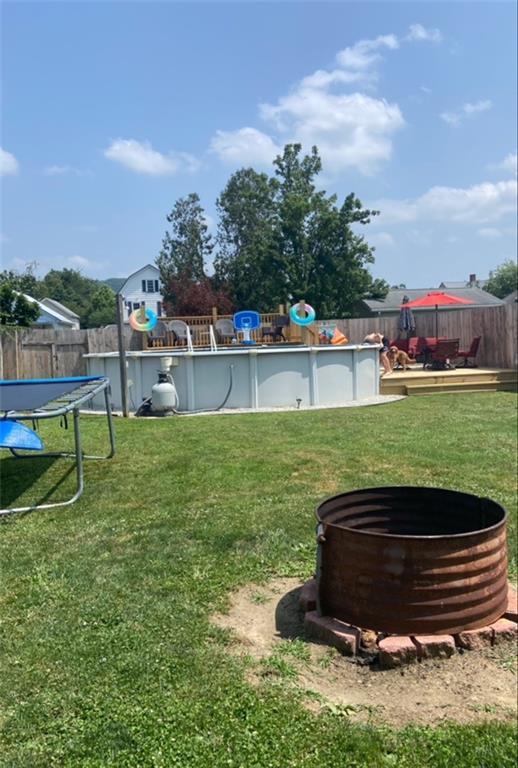 117 Erie Street Polk, PA 16342 - Photo 35 of 35 a wooden bench sitting in the middle of a park
