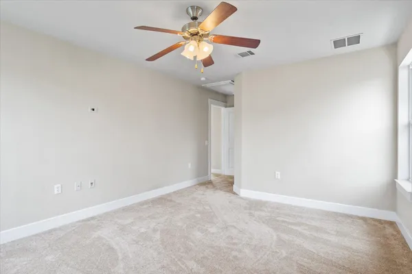 a bathroom with a sink a large mirror and a vanity