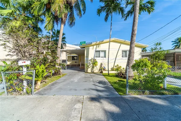 a view of a garden with a patio