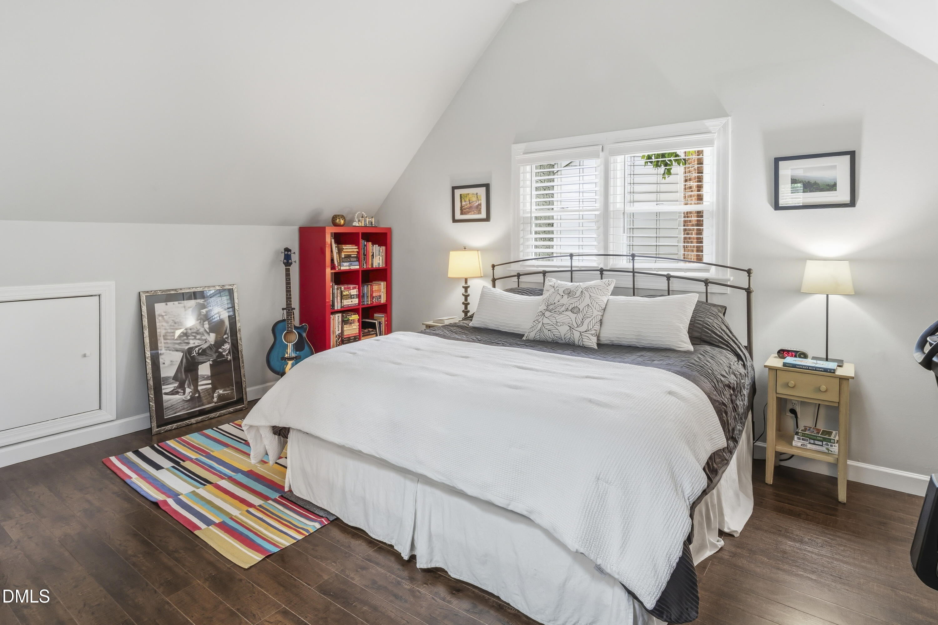 3004 West Annaley Drive Raleigh, NC 27604 - Photo 33 of 44 a bedroom with bed and wooden floor