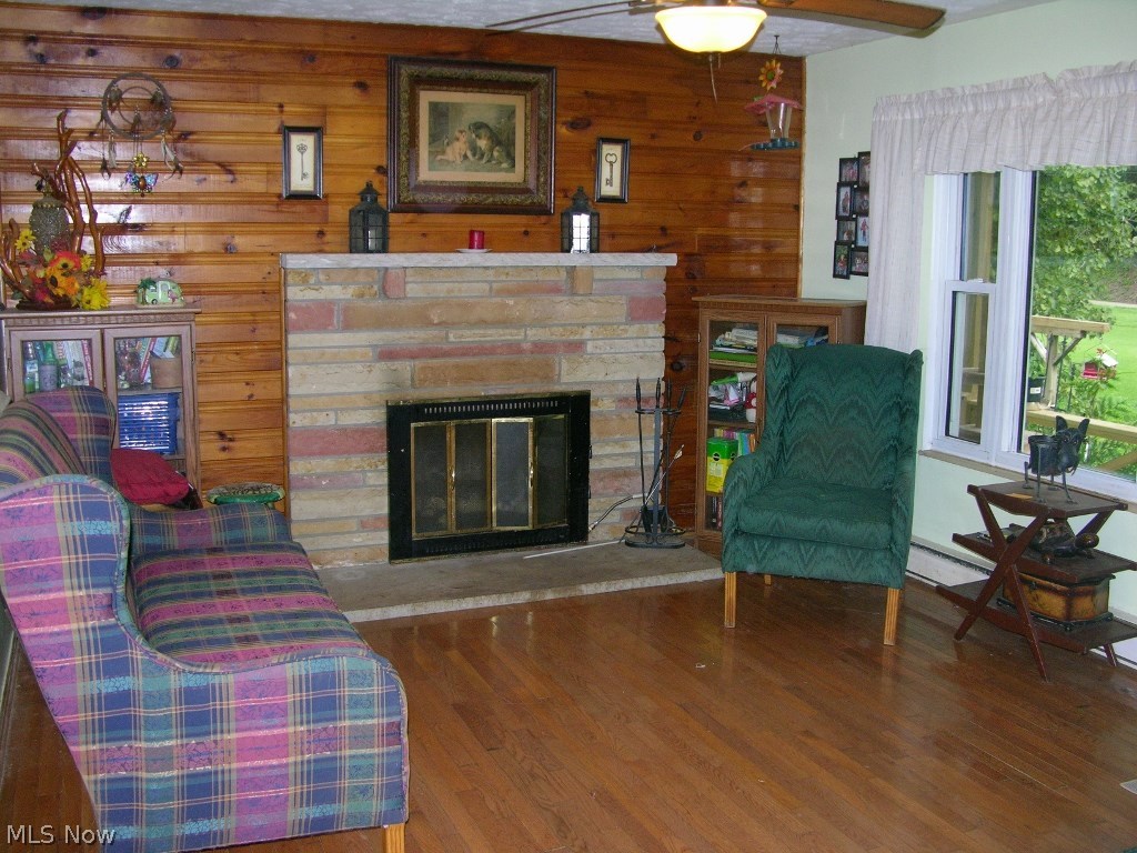 2788 Friendly Hill Road Friendly, WV 26146 - Photo 4 of 13 Living Room with Hardwood Floors and Fireplace