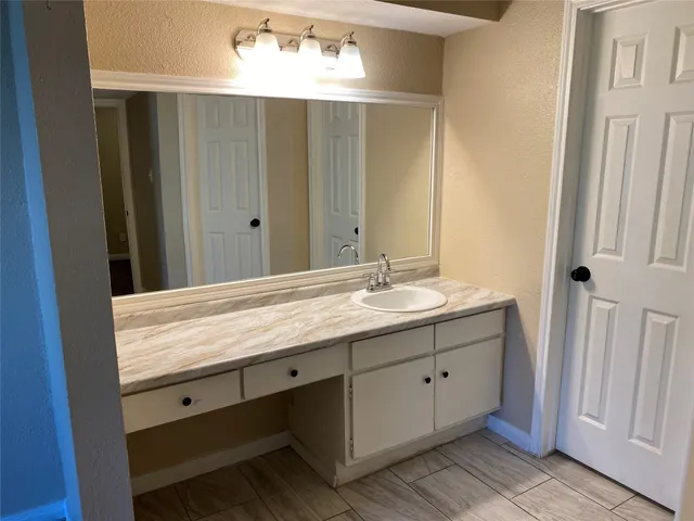 a view of a room with rack on the wall