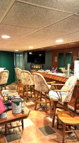 a outdoor space with furniture and a fireplace