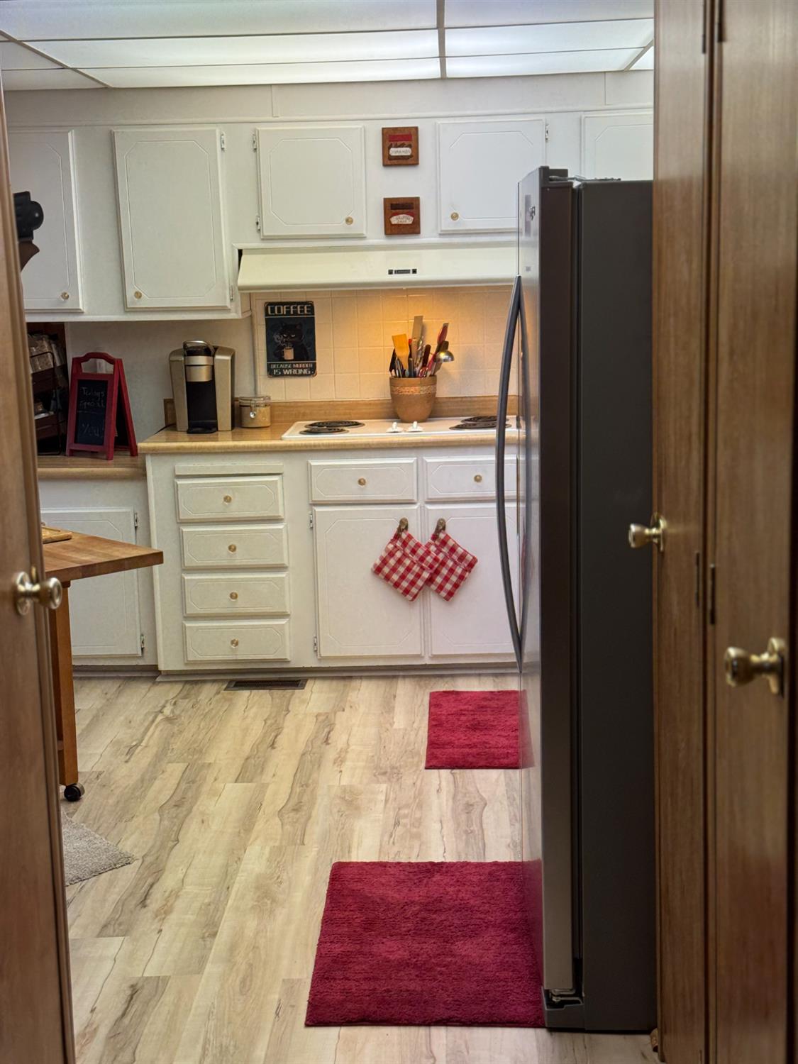 4420 Pleasant Valley Road, Unit 130 Diamond Springs, CA 95619 - Photo 14 of 39 a view of kitchen with cabinet and workspace