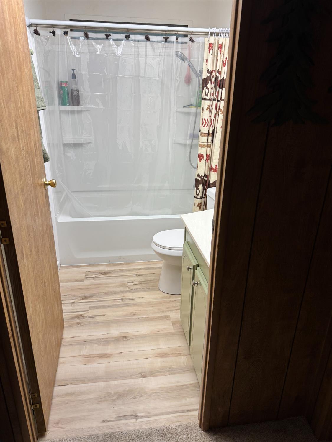 4420 Pleasant Valley Road, Unit 130 Diamond Springs, CA 95619 - Photo 16 of 39 a bathroom with a toilet and a shower