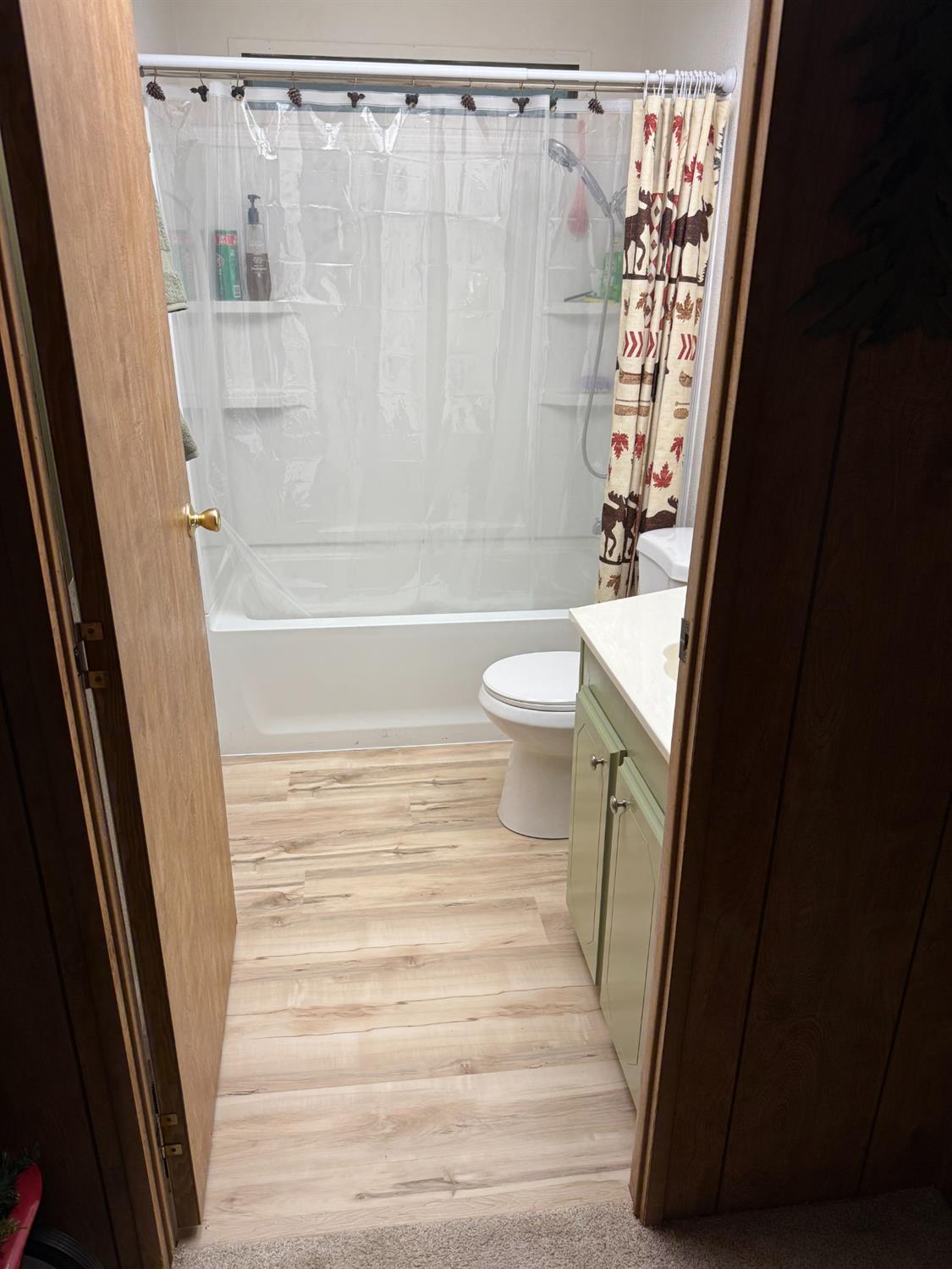 4420 Pleasant Valley Road, Unit 130 Diamond Springs, CA 95619 - Photo 17 of 39 a bathroom with a sink and a toilet