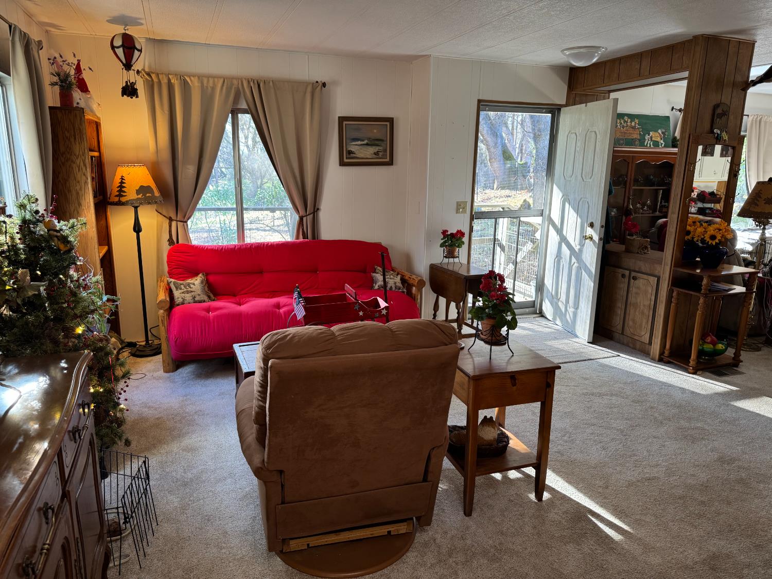 4420 Pleasant Valley Road, Unit 130 Diamond Springs, CA 95619 - Photo 18 of 39 a living room with furniture and a flat screen tv
