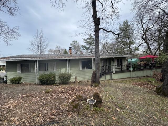 4420 Pleasant Valley Road, Unit 130 Diamond Springs, CA 95619 - Photo 5 of 39 a front view of a house with garden