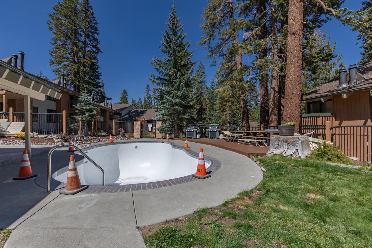 25 Lee Road, Unit 111 Mammoth Lakes, CA 93546 - Photo 26 of 32 a view of a swimming pool with a patio
