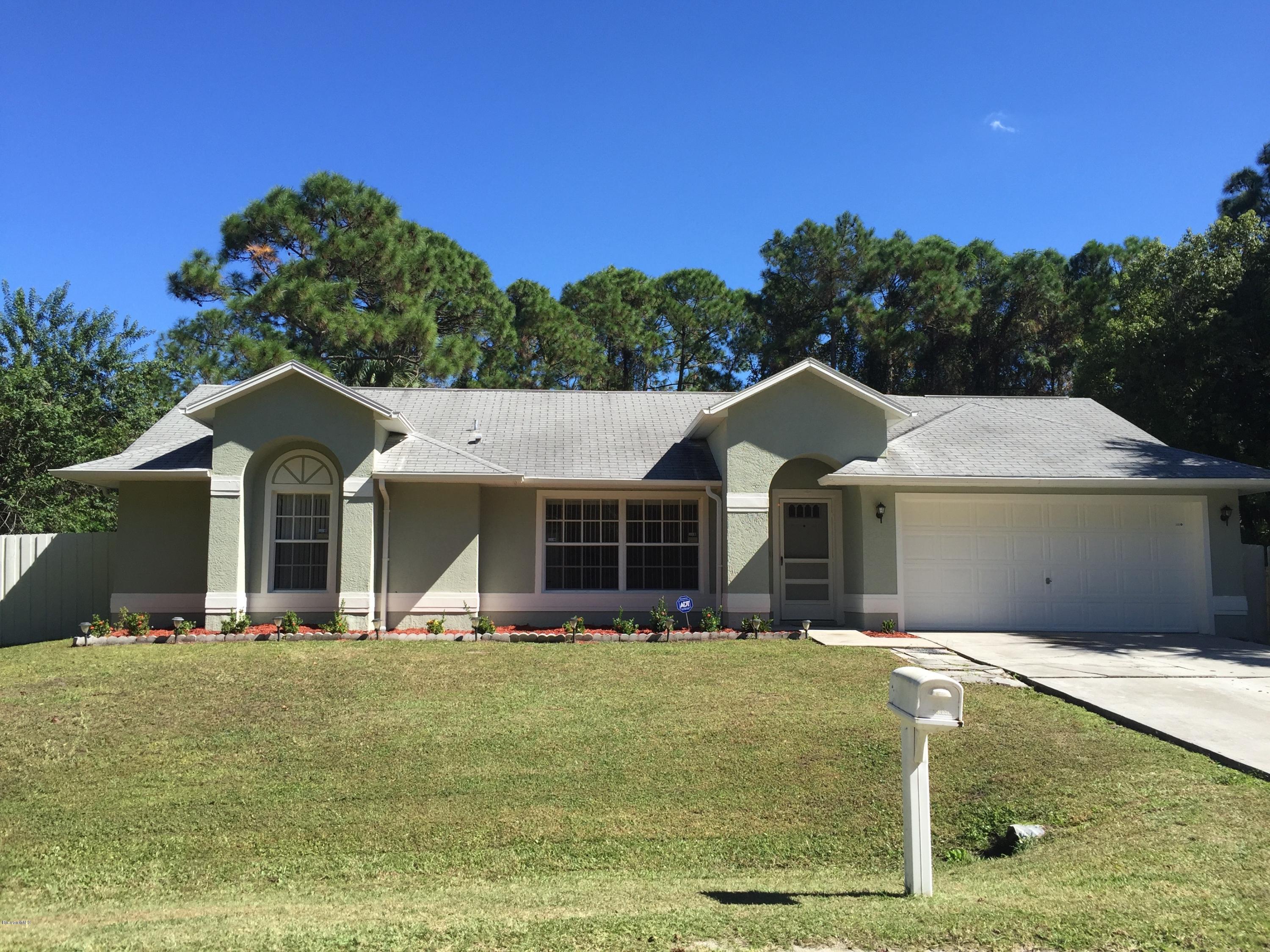 1095 Savery Road Palm Bay, FL 32908 - Photo 1 of 24 Front
