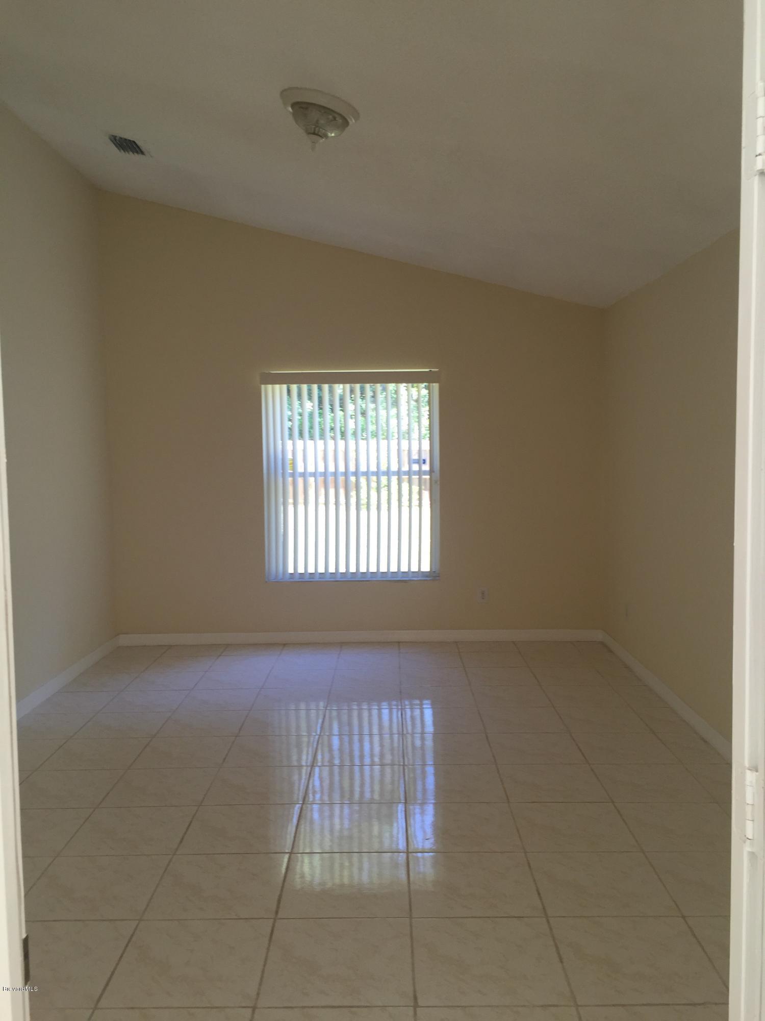 1095 Savery Road Palm Bay, FL 32908 - Photo 6 of 24 Master Bedroom