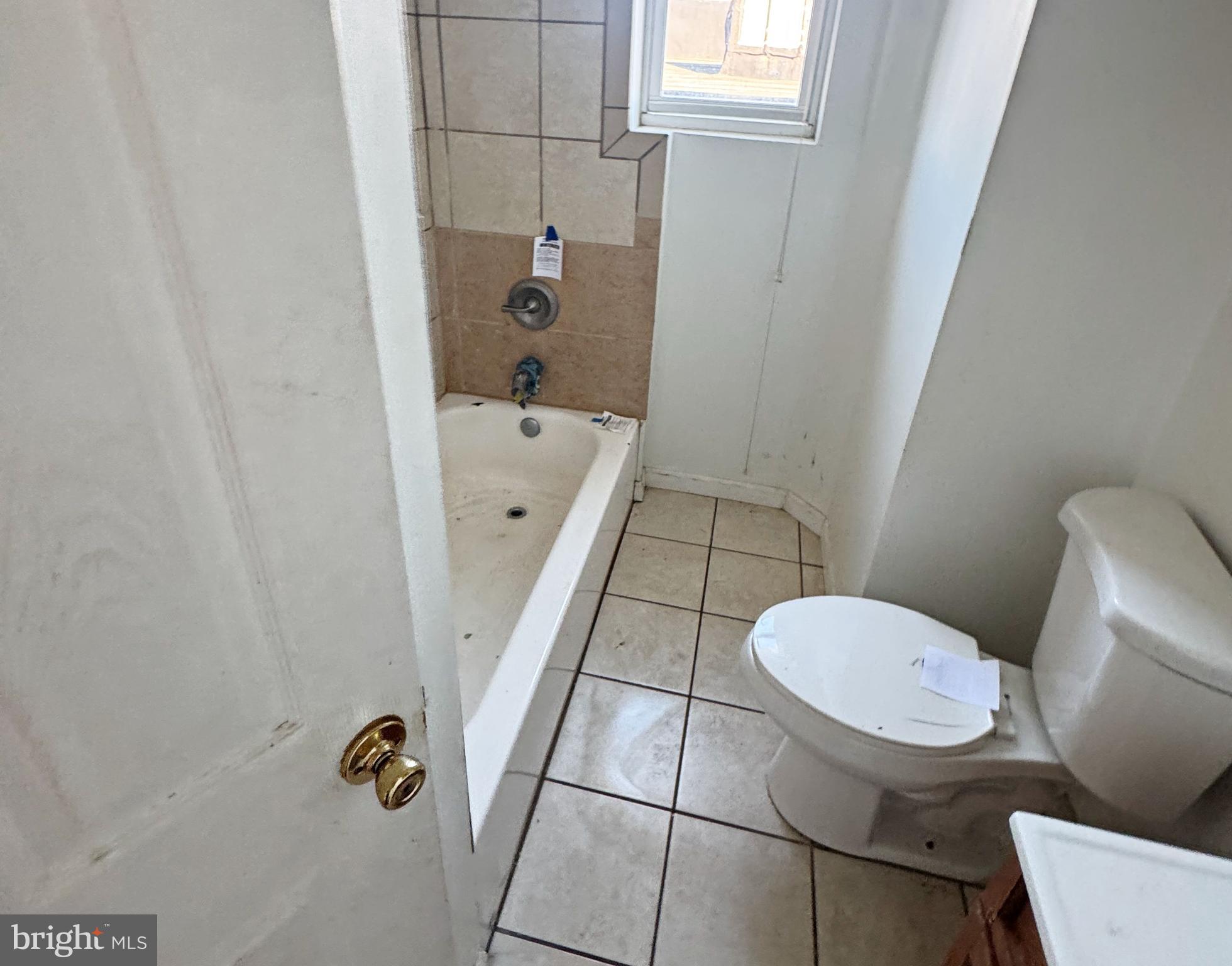 3012 Kentucky Avenue Baltimore, MD 21213 - Photo 13 of 20 a bathroom with a sink and toilet