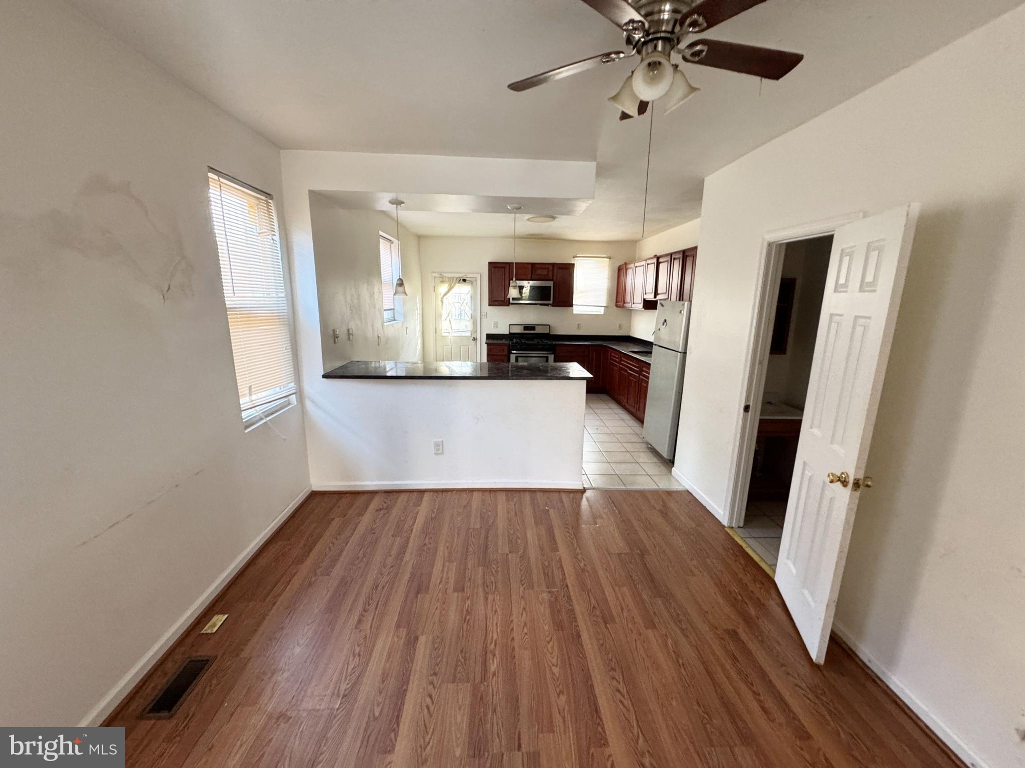 3012 Kentucky Avenue Baltimore, MD 21213 - Photo 5 of 20 a view of a kitchen from a hallway
